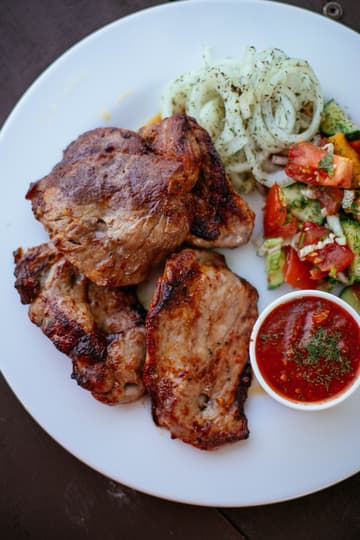 Cast-Iron Pork Chops with Dill Onions and Tomato Salad