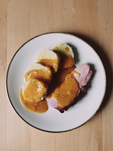 Roast Pork Loin with Bread Dumplings and Caraway Gravy