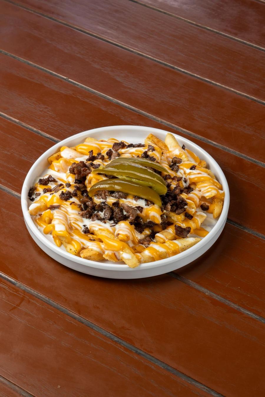 Loaded Cheese Fries with Seasoned Beef and Pickles